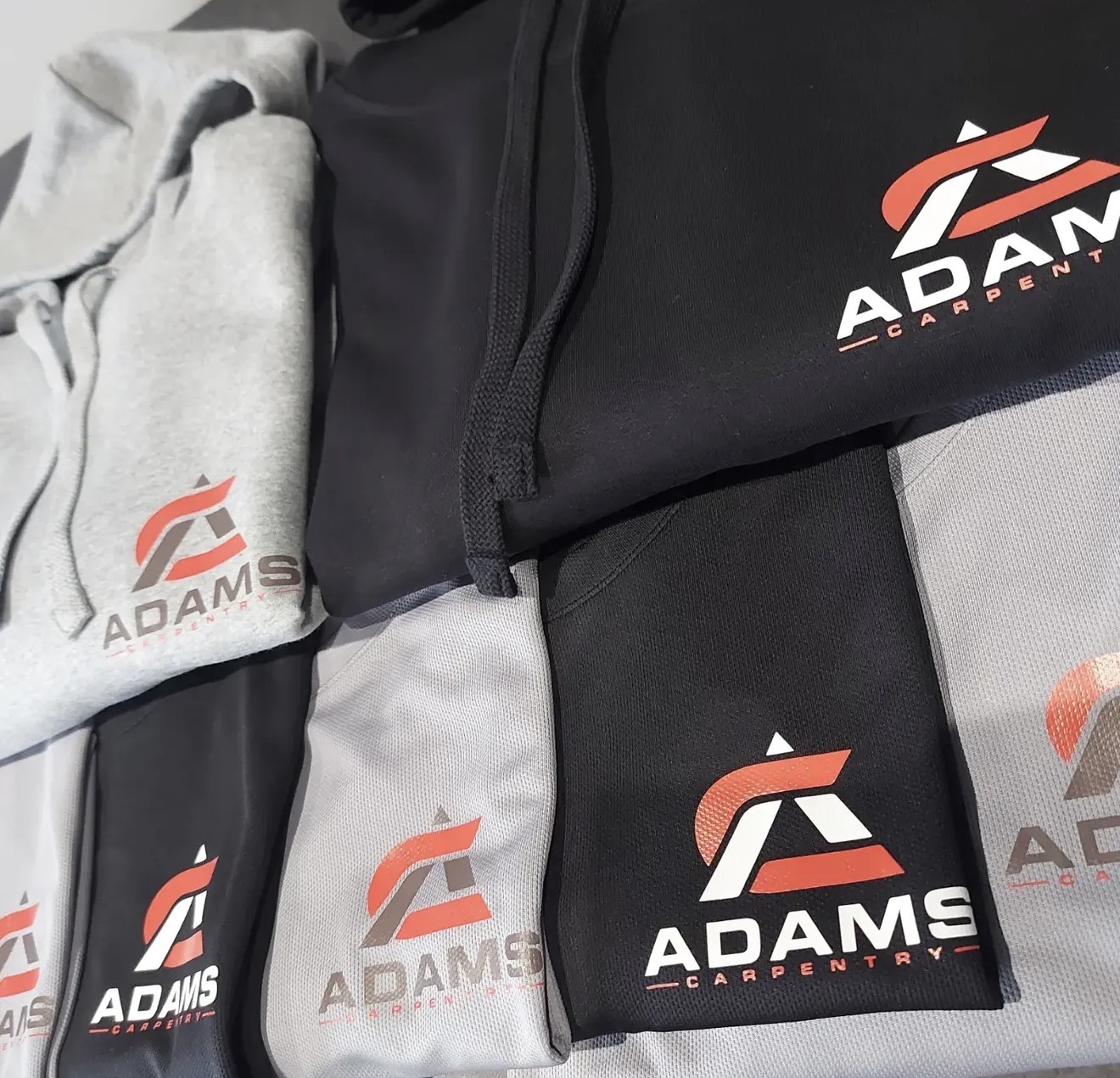 Adams Carpentry printed hoodies and t-shirts